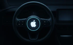 Futuristic steering wheel glowing with Apple logo.